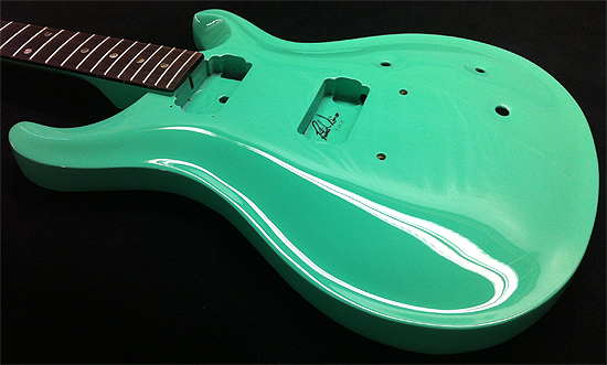 vintage surf green guitar