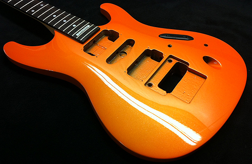 custom painted orange guitar