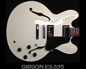 Vintage white gibson guitar