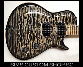 quilted maple transparent black guitar